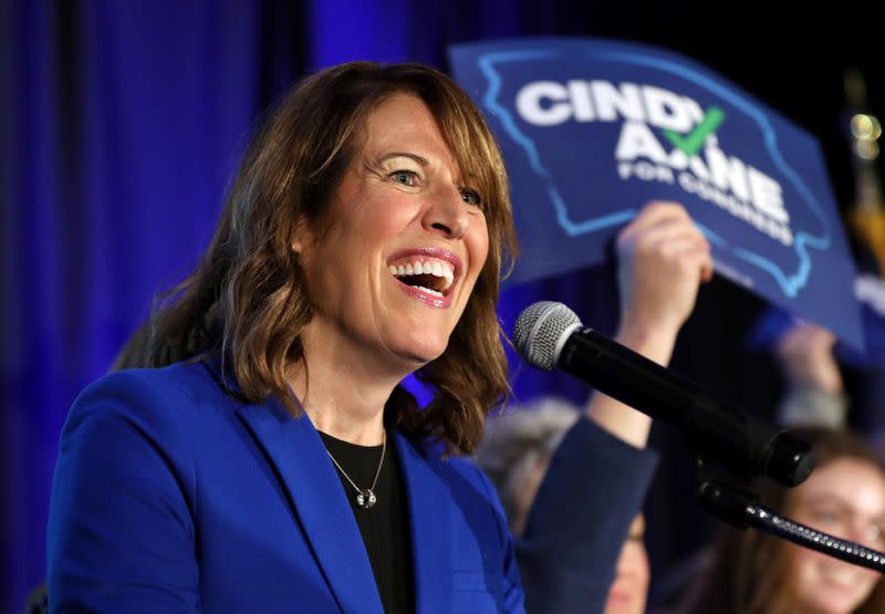 Democratic congressional candidate Cindy Axne reacts while appearing at her midterm election night party in Des Moines