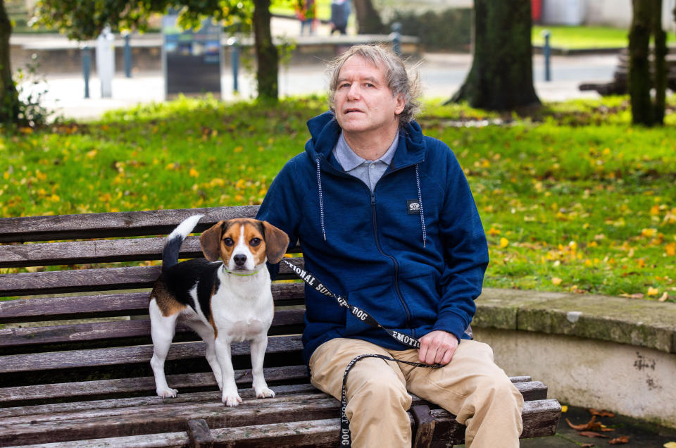 Christopher Palmer outside the Plymouth Crown Court in Devon, with his dog Tammy. 26/11/2019 See SWNS story SWSYevict. A vulnerable man has been hauled to court and faces eviction over his medically prescribed 'emotional support companion dog' - despite doctors demanding he be allowed to keep it. Christopher Palmer, 63, has suffered years of depression, anxiety and mental health problems - leaving him socially isolated with suicidal tendencies. But things changed when Christopher's doctor prescribed him an emotional support and mental wellness animal companion - a beagle called Tammy in December 2018. Despite Christopher's pet being prescribed by a doctor, when Plymouth Community Homes found out, they ordered the dog had to be rehomed.