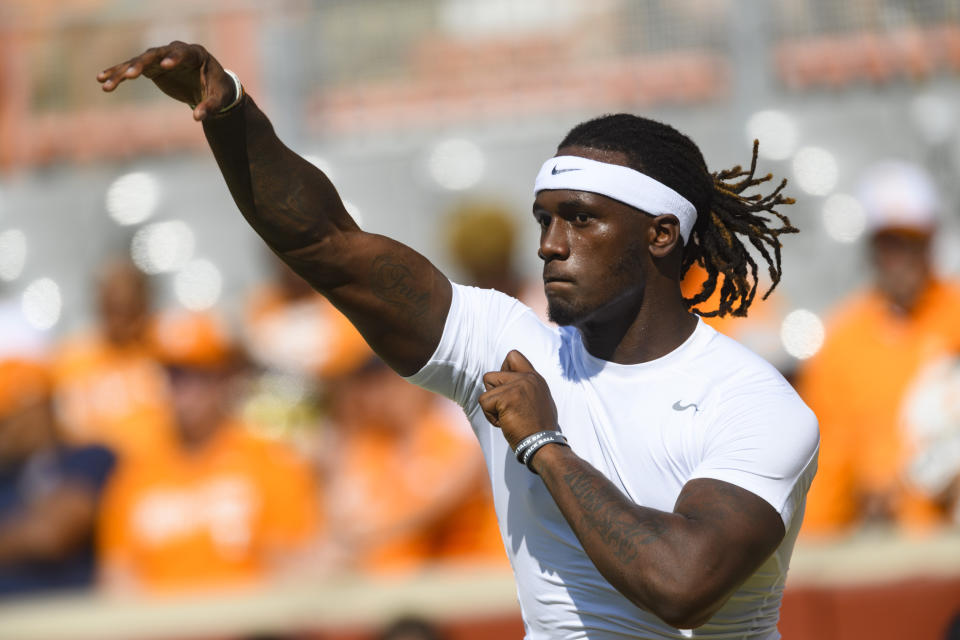 FILE - Tennessee quarterback Joe Milton III warms up before an NCAA football game against Pittsburgh on Sept. 11, 2021, in Knoxville, Tenn. Sixth-year Tennessee quarterback Milton will get the chance to showcase how much he’s grown in the upcoming season. (AP Photo/John Amis, File)