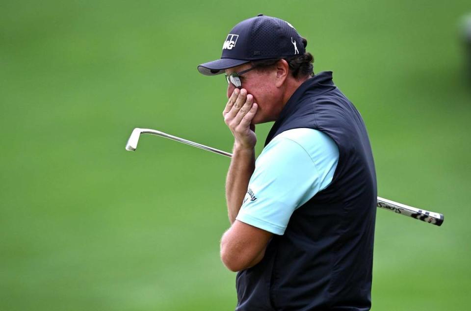 Golfer Phil Mickelson reacts after missing a putt on the 15th green during second round action of the Wells Fargo Championship at Quail Hollow Club in Charlotte, NC on Friday, May 7, 2021. Mickelson finished the round scoring a 75 and is -3 for the tournament.