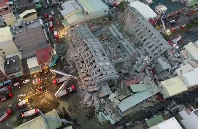 This video frame grab taken and provided by CTI TV on February 6, 2016 shows an aerial view of the site of a collapsed building in the southern Taiwanese city of Tainan following a strong 6.4-magnitude earthquake