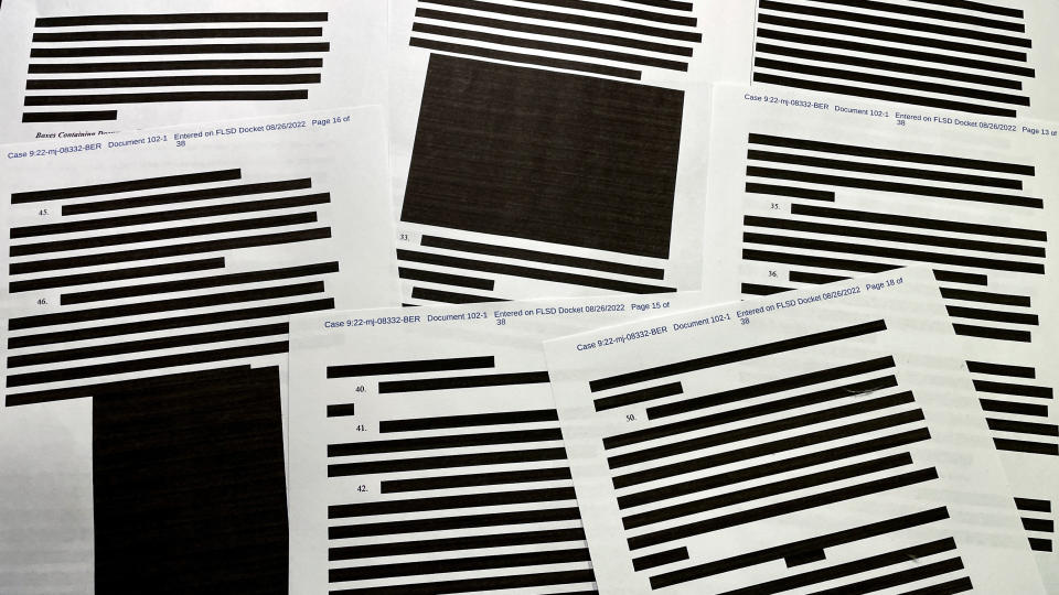 Pages of entirely redacted information are seen in the released version of an affidavit from the U.S. Justice Department that was submitted to a federal judge to support the execution of a search warrant by the FBI at former President Donald Trump's Mar-a-Lago estate after the affidavit was released to the public by the U.S. District Court for the Southern District of Florida with more than half the information in the document redacted in West Palm Beach, Florida, U.S. August 26, 2022.  REUTERS/Jim Bourg