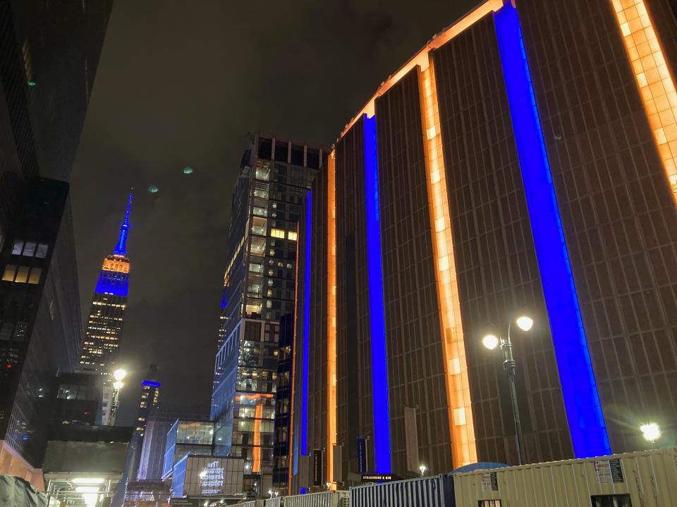 The Empire State Building and Madison Square Garden are lit up in blue and gold after Marquette won the Big East tournament championship on Saturday.