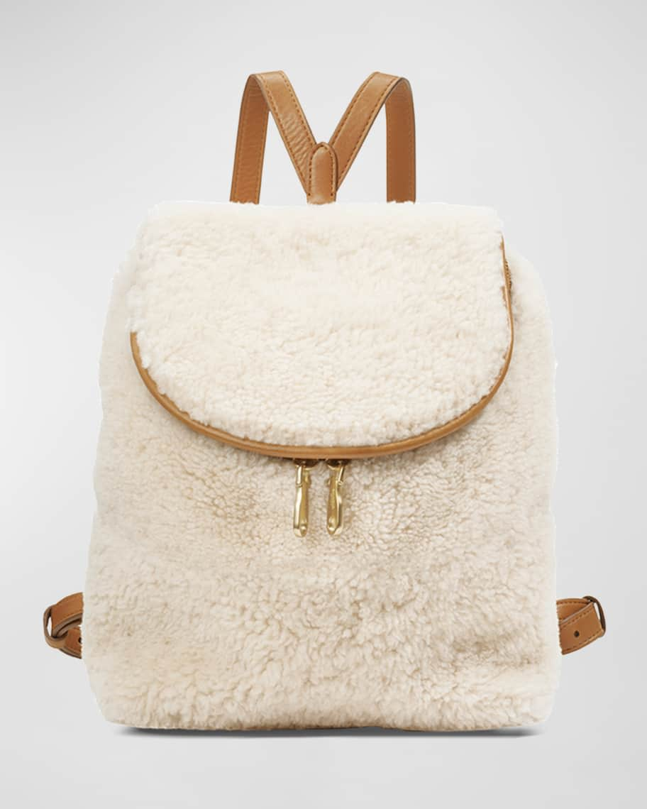 <p><a href="https://go.redirectingat.com?id=74968X1596630&url=https%3A%2F%2Fwww.neimanmarcus.com%2Fp%2Fshinola-the-mini-pocket-shearling-backpack-prod254550054&sref=https%3A%2F%2Fwww.cosmopolitan.com%2Fstyle-beauty%2Ffashion%2Fg43528593%2Fdesigner-backpacks%2F" rel="nofollow noopener" target="_blank" data-ylk="slk:Shop Now;elm:context_link;itc:0;sec:content-canvas" class="link ">Shop Now</a></p><p>The Mini Pocket Shearling Backpack</p><p>$750.00</p><p>https://www.neimanmarcus.com</p>