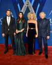 <p>They’re the squad that everybody wants to be a part of. The members of Little Big Town all look suited and booted for the big night. (Photo: Getty Images) </p>