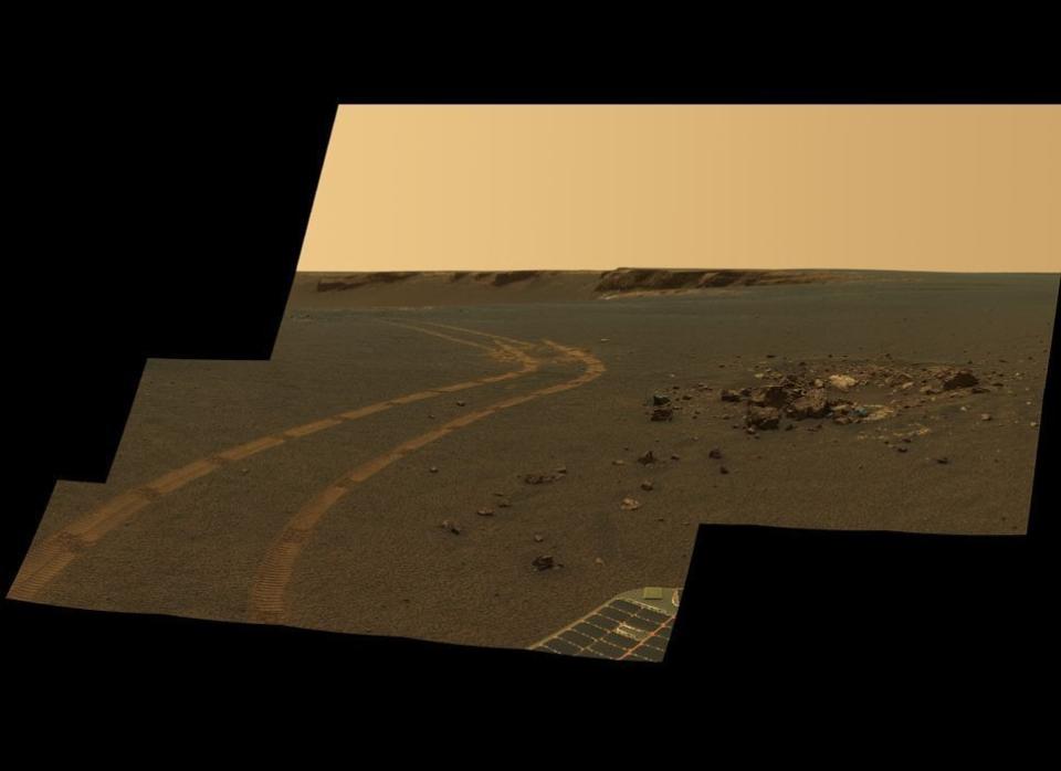 Having completed the study of Victoria crater in late 2008, Opportunity is now heading towards an even larger crater called Endeavour.  Even using new driving methods like the obstacle-avoidance software shown tested here in this sol 1162 (May 2, 2007) Pancam postcard, the rover won't get to Endeavour until sometime in 2011 or maybe even 2012.    <em>From "Postcards from Mars" by Jim Bell; Photo credit: NASA/JPL/Cornell University</em>  