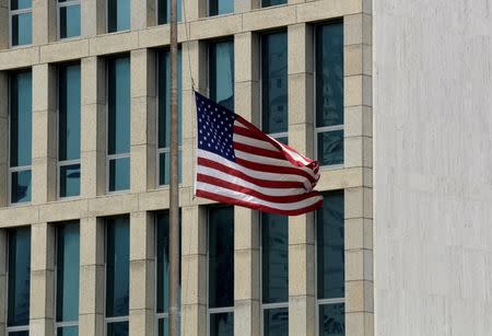 The U.S. flag flies near the U.S. embassy building in Havana, Cuba, July 20, 2016. REUTERS/Enrique de la Osa