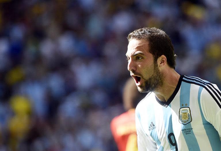 Argentina's Gonzalo Higuain celebrates after scoring during the quarter-final match against Belgium at the Mane Garrincha National Stadium in Brasilia during the 2014 FIFA World Cup on July 5, 2014