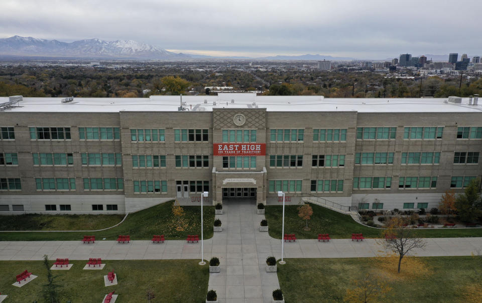 This Oct. 28, 2019 photo, shows the facade of East High School in Salt Lake City. The iconic filming location of Disney's High School Musical still stands as a typical American high school, with a not-so-typical draw from tourists. (Kristin Murphy/The Deseret News via AP)