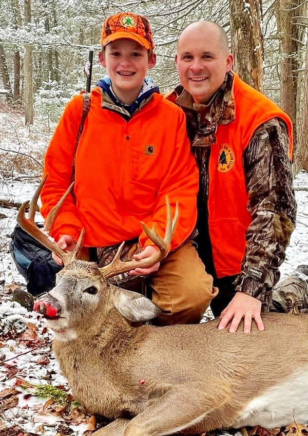 Ethan Corso (left) is 12-years-old. He harvested a massive 10-pointer while hunting with his Dad (right) at the Welcome Lake Rod & Gun Club.