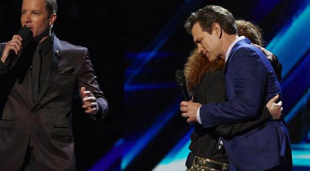 Jimmy hugs his mentor Chris Isaak after being eliminated from the show. Source: AAP