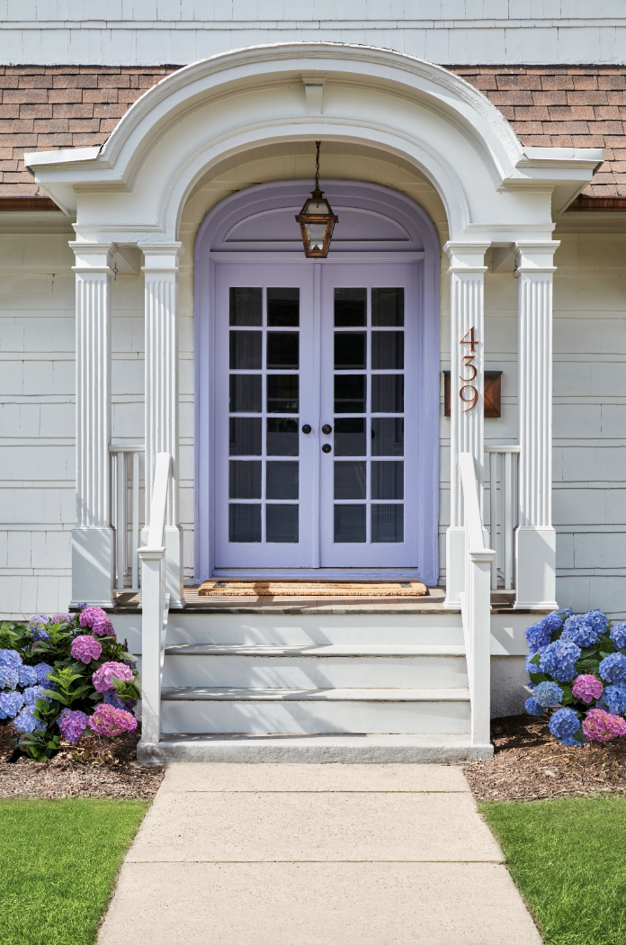 a white door with a light above it