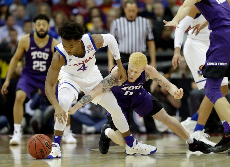 Devonte’ Graham and Kansas struggled without the suspended Josh Jackson. (Getty)