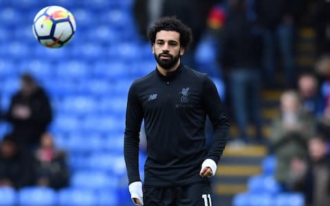  Liverpool's Mohamed Salah during the warm up before the match  - Credit: DYLAN MARTINEZ/Reuters