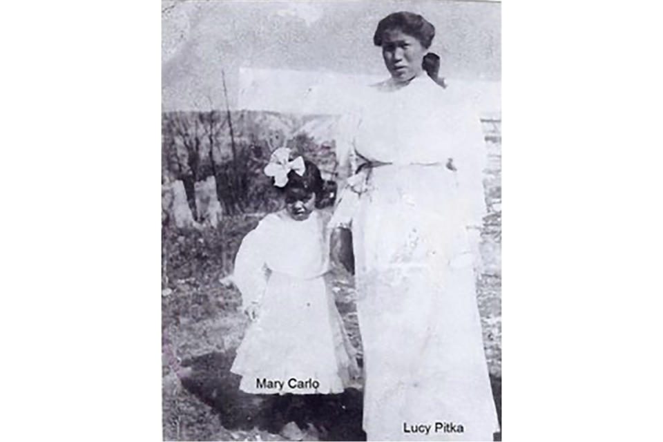 In this photo believed taken in 1925, Lucille Pitka McCormick, right, is shown with her daughter Mary Carlo in the village of Rampart, Alaska. McCormick was one of the Lost Alaskans sent to a mental hospital in the 1930s. Her grave was recently discovered, and family members brought her back to Alaska for a proper burial. (Photo by Wally Carlo via AP).