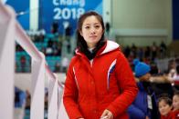 <p>North Korean cheerleaders during the women’s preliminary round ice hockey match between Switzerland and the Unified Korean team during the Pyeongchang 2018 Winter Olympic Games at the Kwandong Hockey Centre in Gangneung on February 10, 2018. </p>