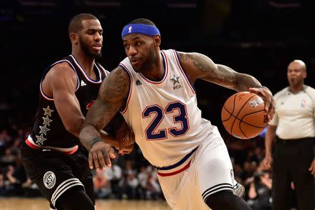 February 15, 2015; New York, NY, USA; Eastern Conference forward LeBron James of the Cleveland Cavaliers (23) dribbles against Western Conference guard Chris Paul of the Los Angeles Clippers (3) during the second half of the 2015 NBA All-Star Game at Madison Square Garden. Mandatory Credit: Bob Donnan-USA TODAY Sports