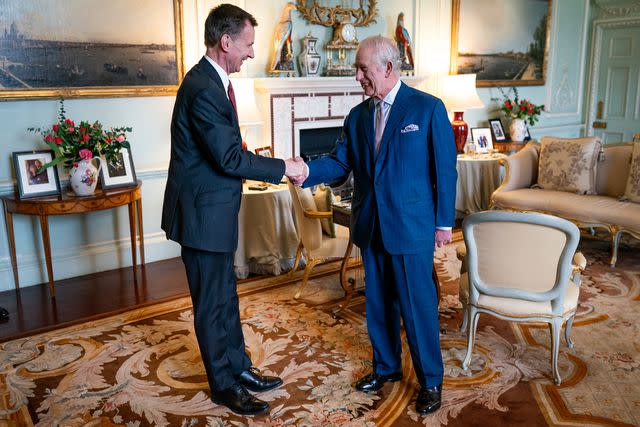 <p>Aaron Chown - WPA Pool/Getty</p> King Charles meets with Chancellor of the Exchequer Jeremy Hunt at Buckingham Palace on March 5.