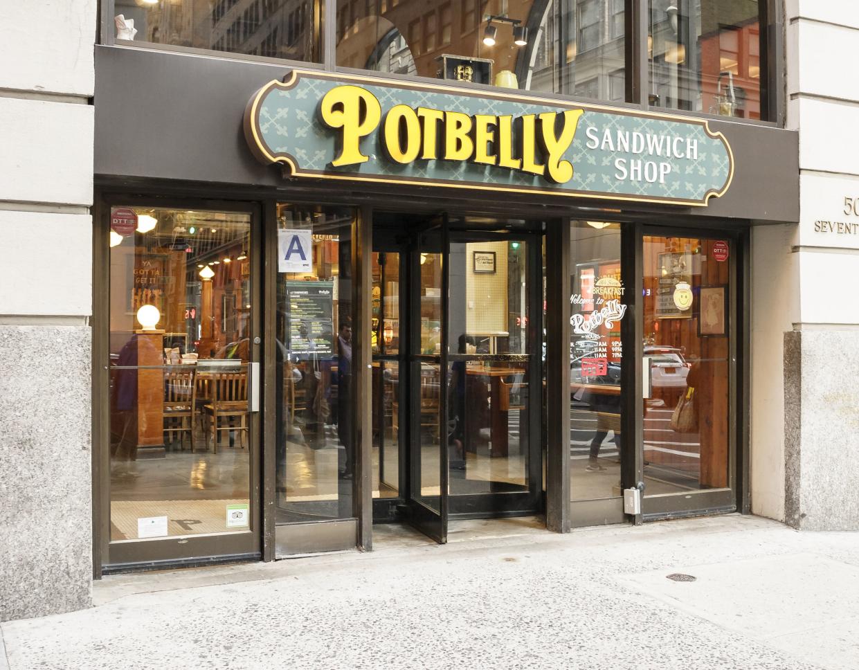 New York, New York, USA - October 8, 2015: A Potbelly Sandwich Shop on 7th Avenue in Manhattan. Potbelly serves sub sandwiches an other items in an
