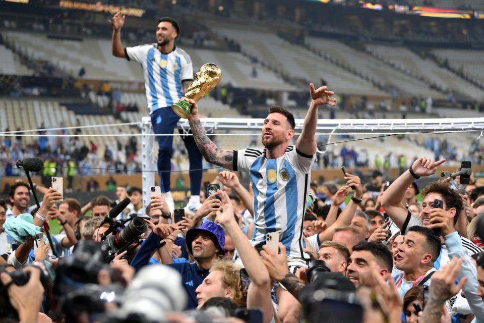 Lionel Messi celebrates winning the World Cup (Getty Images)