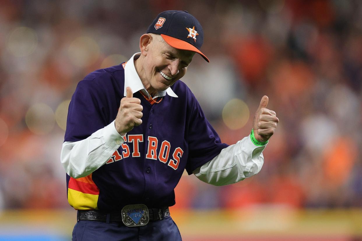 Jim McIngvale throws out the first pitch prior to Game Six of the 2022 World Series at Minute Maid Park.