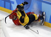 Ice Hockey - Pyeongchang 2018 Winter Olympics - Men Final Match - Olympic Athletes from Russia v Germany - Gangneung Hockey Centre, Gangneung, South Korea - February 25, 2018 - Olympic Athlete from Russia Ivan Telegin and Christian Ehrhoff of Germany collide. REUTERS/David W Cerny