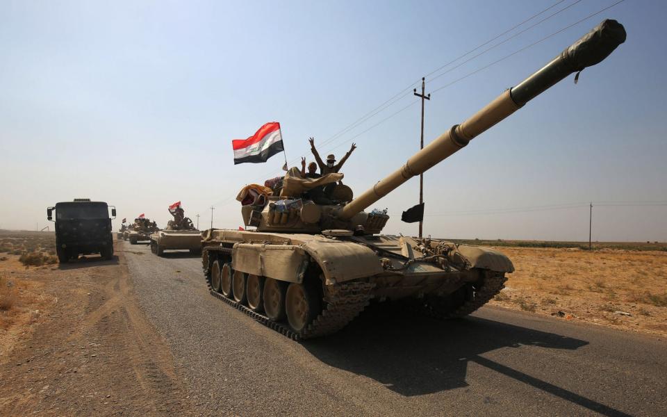 Iraqi forces drive towards Kurdish peshmerga positions - AFP