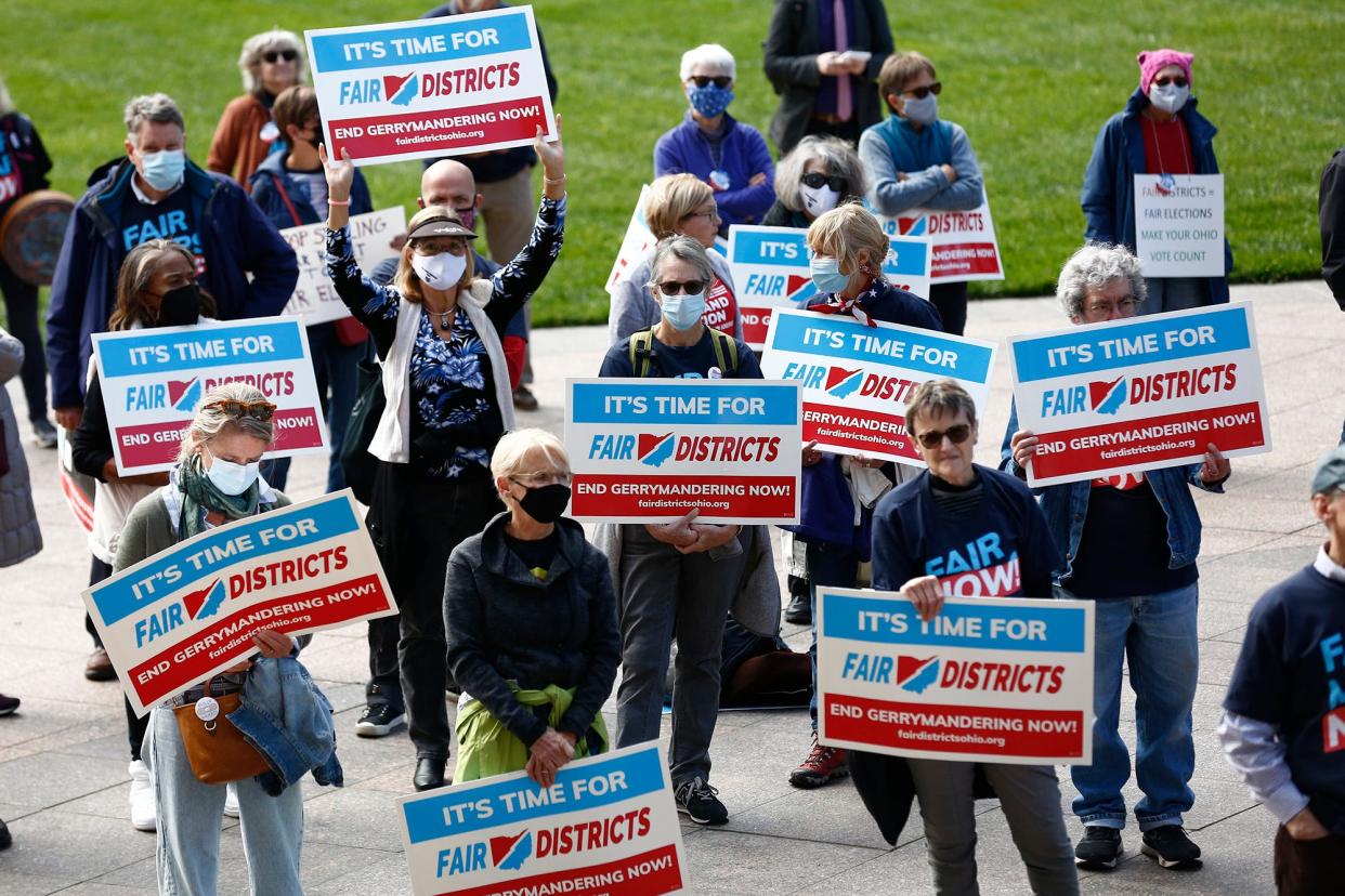 Supporters of Fair Districts in Ohio rally outside the Ohio Statehouse in Columbus, Ohio, after a Ohio Redistricting Commission held a meeting on Thursday, October 28, 2021.