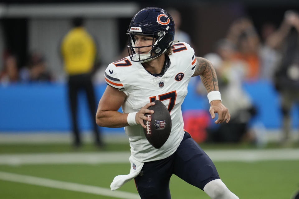 Chicago Bears quarterback Tyson Bagent scrambles during the first half of an NFL football game against the Los Angeles Chargers, Sunday, Oct. 29, 2023, in Inglewood, Calif. (AP Photo/Ashley Landis)