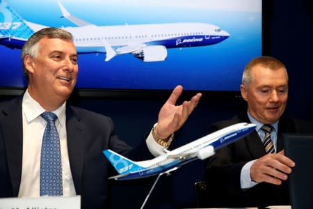 FILE PHOTO: Boeing Commercial Airplanes CEO Kevin McAllister and International Airlines Group CEO Willie Walsh attend the Boeing 737 MAX 8 commercial announcement during the 53rd International Paris Air Show at Le Bourget Airport near Paris