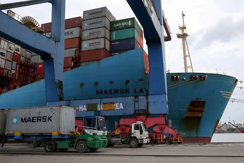 FILE PHOTO: A Maersk ship and containers are seen at the Port of Santos