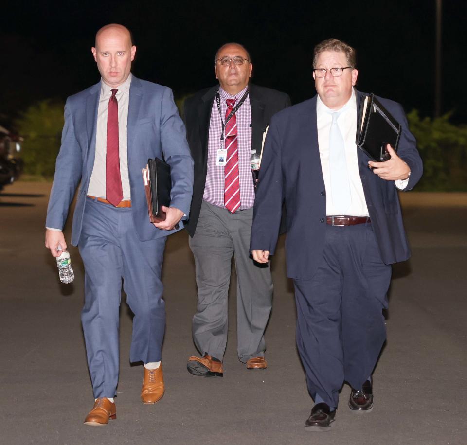 From left, Brockton Public Schools Assistant Chief Financial Officer Chris Correia; Brockton Public Schools Chief Financial Officer Aldo Petronio; and Brockton Chief Financial Officer Troy Clarkson leave a closed-door Brockton School Committee meeting at Brockton High School on Thursday, Aug. 31, 2023.