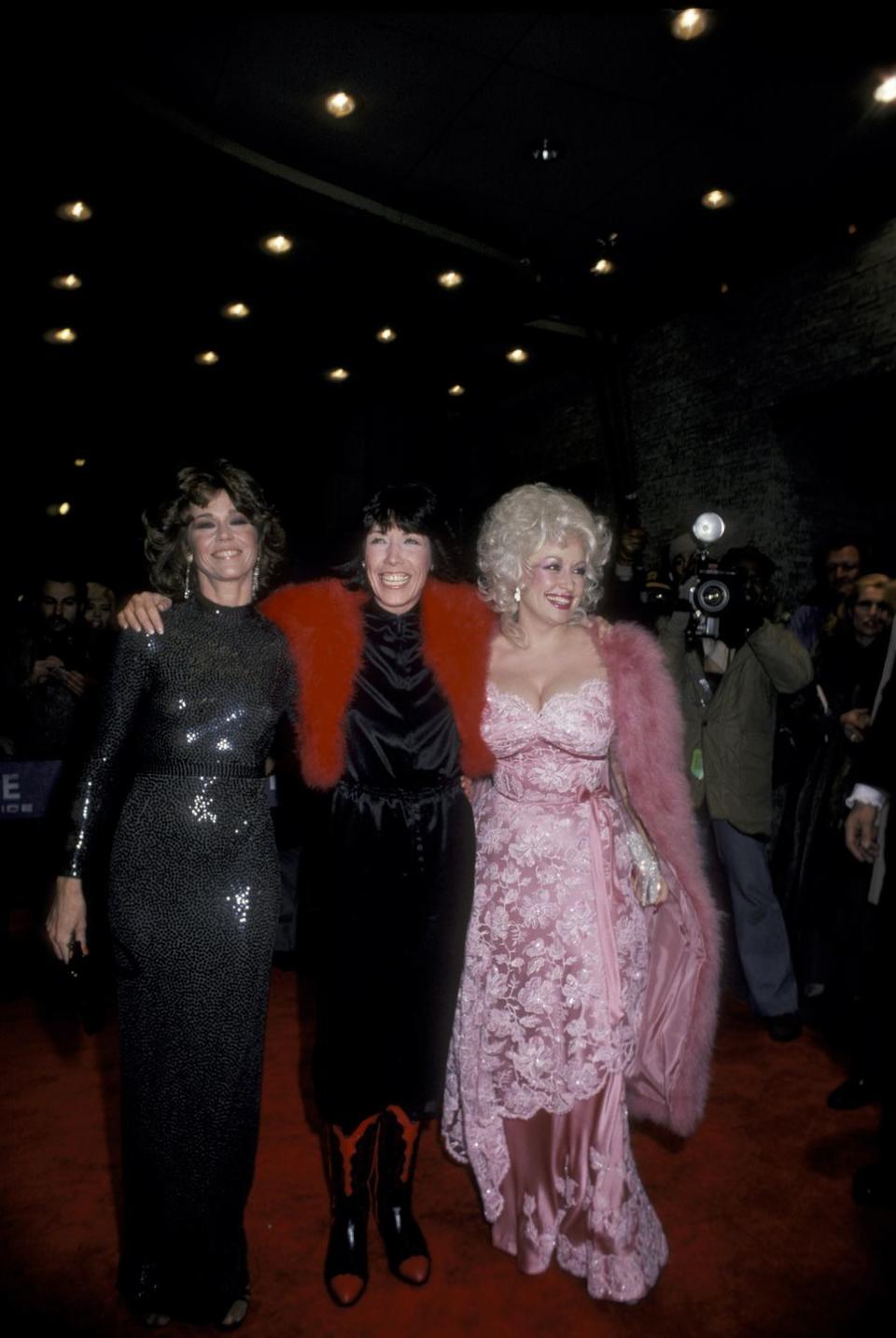 <p>While Dolly Parton had released more than a dozen albums before 1980's "9 to 5," this was her first movie role. For the premiere, Dolly hired costume designer Ann Roth to create a red carpet-worthy gown. Dolly <a href="https://people.com/style/dolly-parton-breaks-down-her-most-iconic-fashion-moments/" rel="nofollow noopener" target="_blank" data-ylk="slk:told People;elm:context_link;itc:0;sec:content-canvas" class="link ">told <em>People</em></a> that this was the first time she truly felt fashionable after nearly 15 years of limelight.</p>