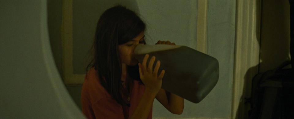 Thanks dad. Madison Taylor Baez chugs blood from the bottle as vampire Eleanor Kane in "Let the Right One In."