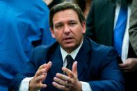 Gov. Ron DeSantis, shown in Miami in May, is calling the compact he signed ‘larger and more expansive than any other gaming compact in U.S. history.’