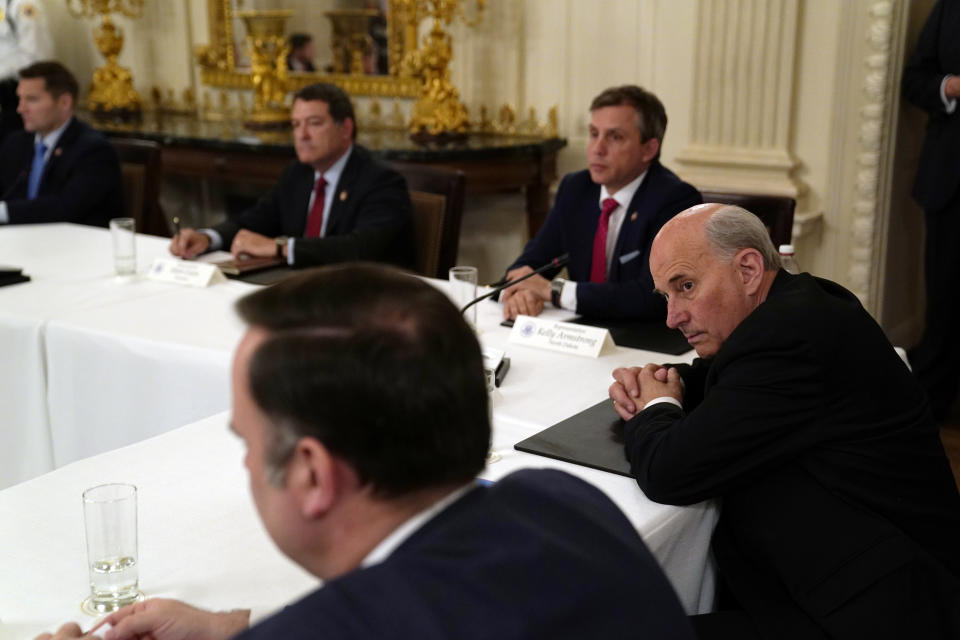 FILE - In this May 8, 2020, file photo Rep. Louie Gohmert, R-Texas, right, listens during a meeting between President Donald Trump and Republican lawmakers in the State Dining Room of the White House in Washington. (AP Photo/Evan Vucci, File)