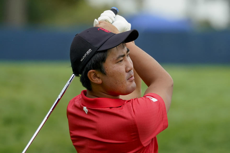Takumi Kanaya, of Japan, plays his shot from the 13th tee during the first round of the US Open Golf Championship, Thursday, Sept. 17, 2020, in Mamaroneck, N.Y. (AP Photo/Charles Krupa)