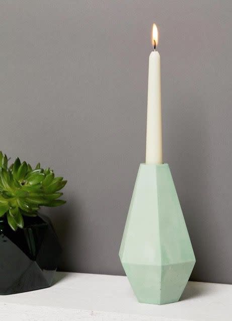 <p><a rel="nofollow noopener" href="http://www.asos.com/moxon/moxon-korridor-medium-concrete-candle-holder/prd/9769807?clr=multi&SearchQuery=&cid=18396&gridcolumn=2&gridrow=11&gridsize=4&pge=1&pgesize=72&totalstyles=313" target="_blank" data-ylk="slk:BUY;elm:context_link;itc:0;sec:content-canvas" class="link ">BUY</a></p>