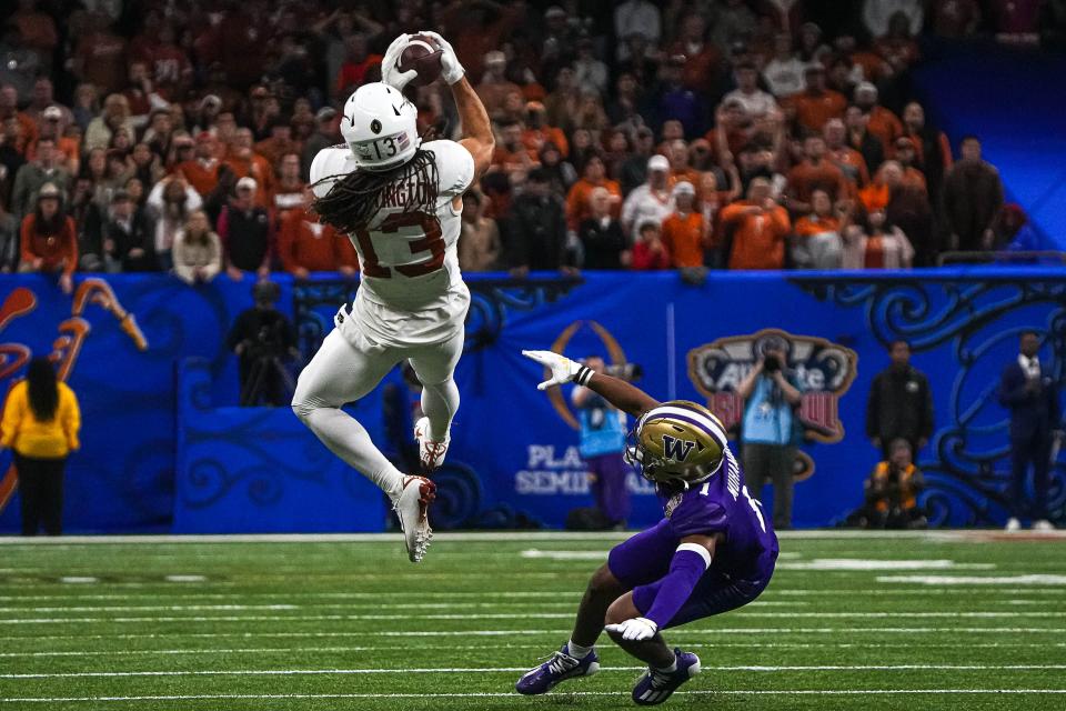 Texas wideout Jordan Whittington's 41-yard catch was the highlight of the Longhorns' final drive, but the team came up on the short end of a 37-31 loss to Washington at the Sugar Bowl. The Horns finished the season at 12-2 with their first national semifinal appearance.