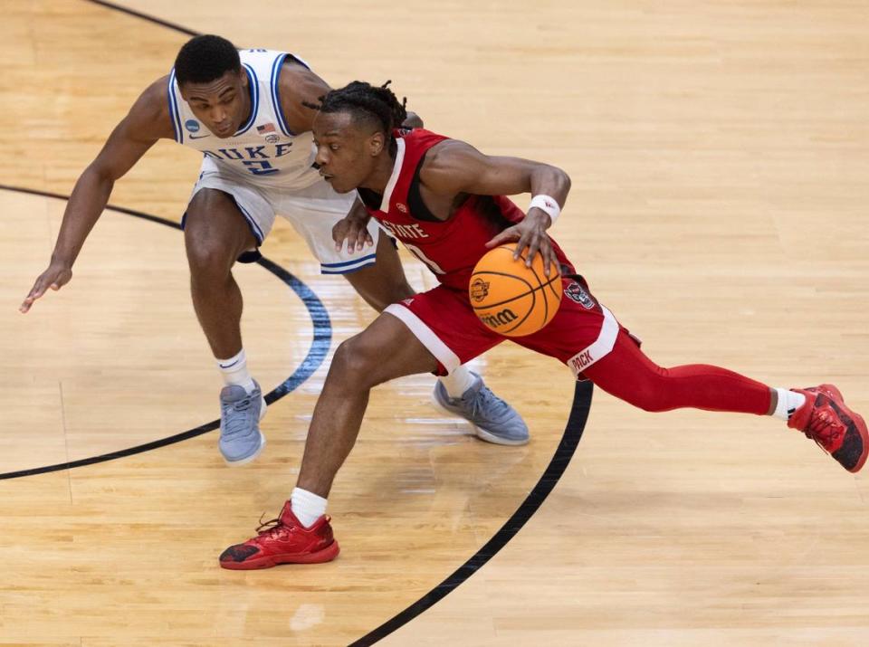 N.C. State’s D.J. Horne (0) drives against Duke’s Jaylen Blakes (2) in the second half during the NCAA South Regional final on Sunday, March 31, 2024 at the American Airlines Center in Dallas, Texas.