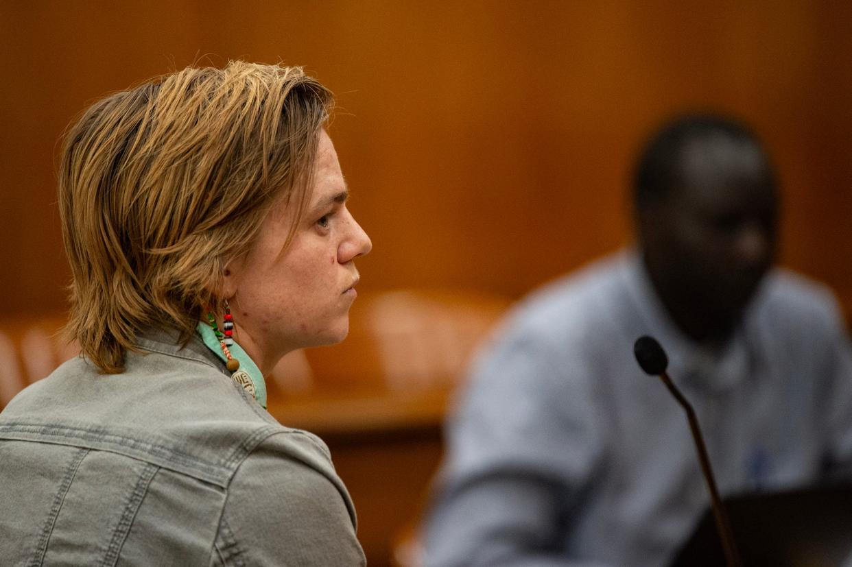 Karissa Bowley, Dau Mabil's wife, sits at the witness stand during the recess in the court case about Dau's death investigation at the Hinds County Chancery Court in Jackson on Tuesday.