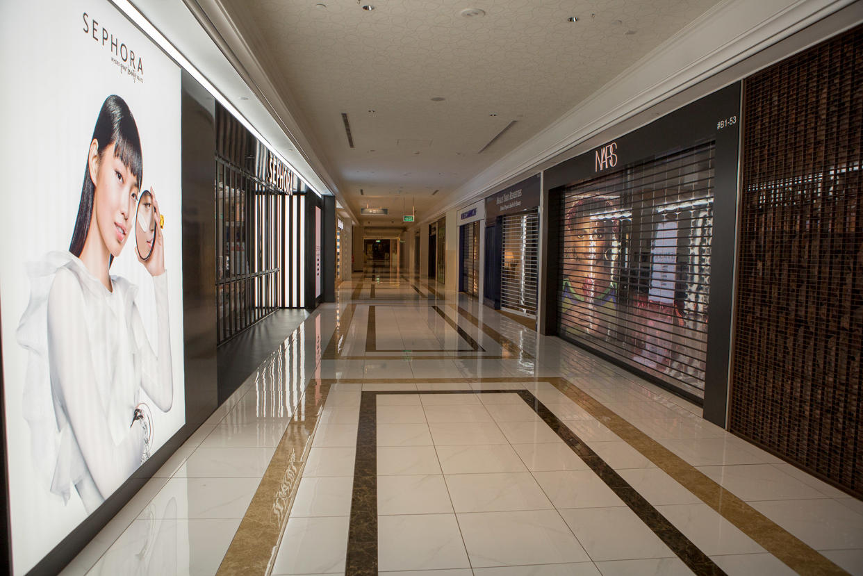 Closed shops seen inside the Ngee Ann City mall on 7 April 2020, the first day of Singapore's month-long circuit breaker period. (PHOTO: Dhany Osman / Yahoo News Singapore)