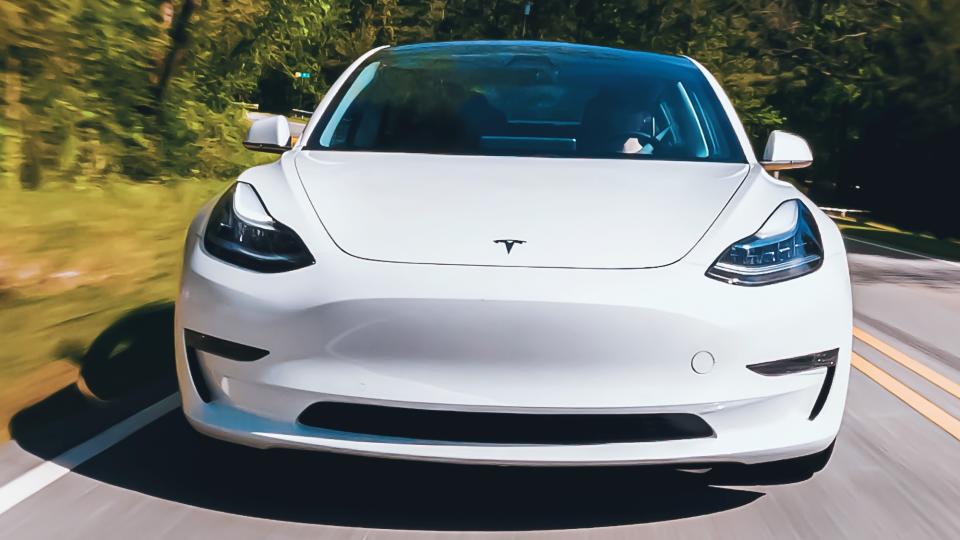 Tesla Model 3 in white on road