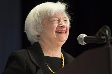 United States Federal Reserve Chair Janet Yellen smiles as she speaks at the 2014 National Interagency Community Reinvestment Conference in Chicago, March 31, 2014. REUTERS/John Gress