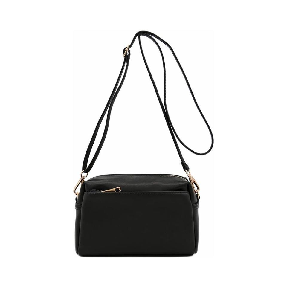 <p><a href="https://www.amazon.com/Small-Triple-Zip-Crossbody-Black/dp/B01LWCSMG2/ref=sr_1_3?tag=syn-yahoo-20&ascsubtag=%5Bartid%7C10051.g.40897294%5Bsrc%7Cyahoo-us" rel="nofollow noopener" target="_blank" data-ylk="slk:Shop Now;elm:context_link;itc:0;sec:content-canvas" class="link ">Shop Now</a></p><p>Triple Zip Small Crossbody Bag</p><p>amazon.com</p><p>$21.90</p>