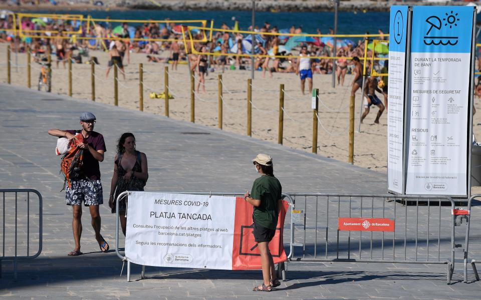 Beaches in Barcelona reached capacity over the weekend, despite new 'stay at home' advice in the city - Getty