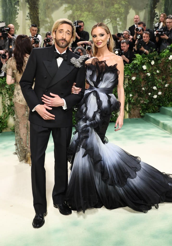 Adrien Brody and Georgina Chapman attend The 2024 Met Gala Celebrating "Sleeping Beauties: Reawakening Fashion" at The Metropolitan Museum of Art on May 06, 2024 in New York City.
