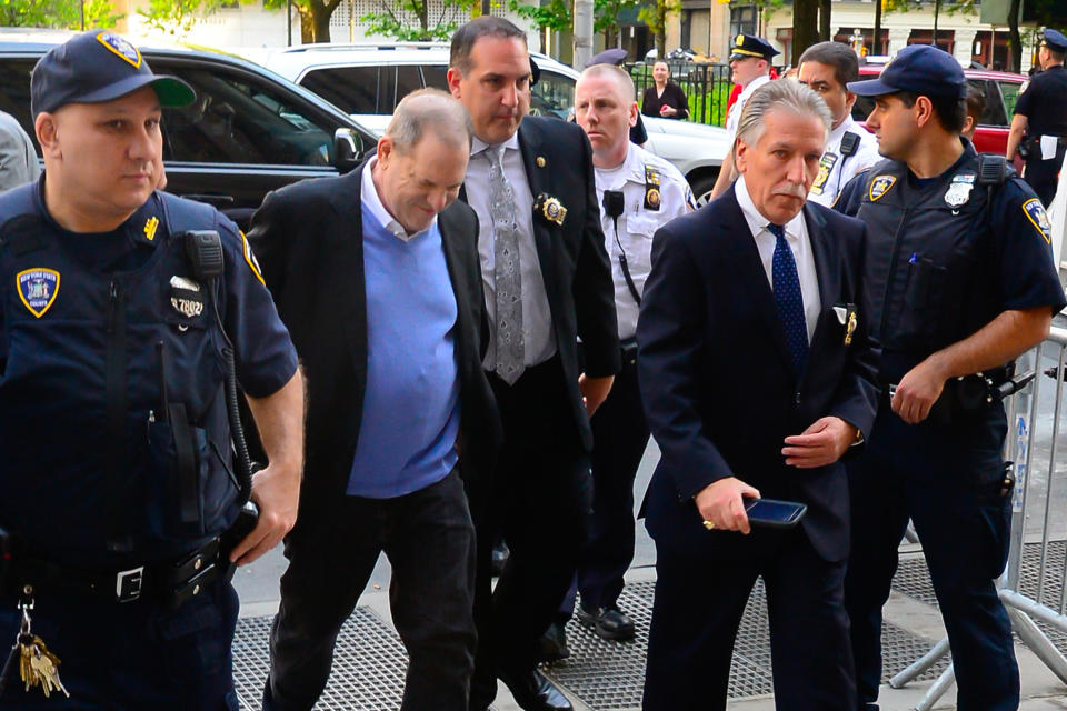 Harvey Weinstein is seen arriving with police officers at 100 Center St. on May 25, 2018, in New York City. (Photo: Raymond Hall/GC Images)