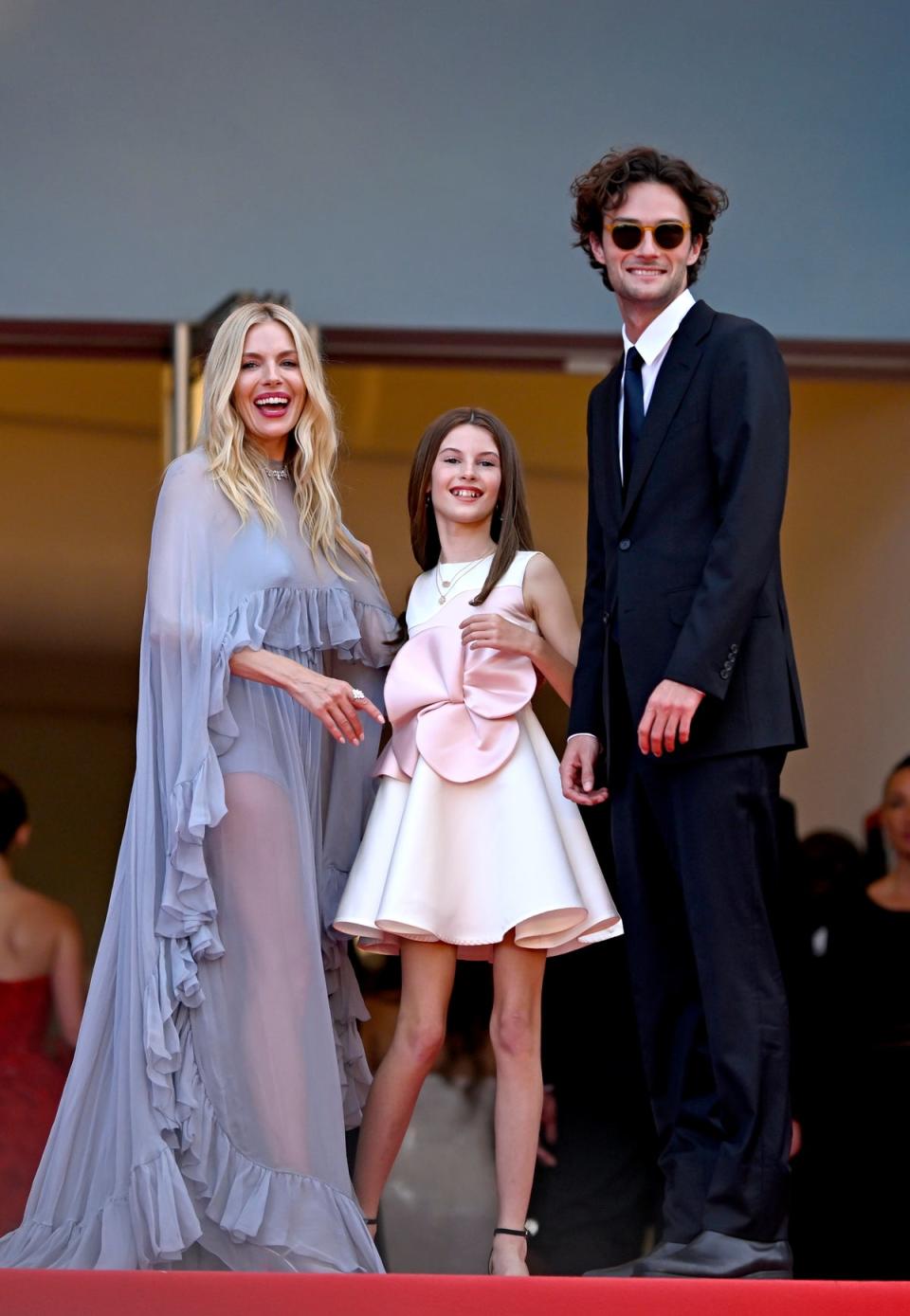 Miller pictured on the red carpet with her family (Getty Images)