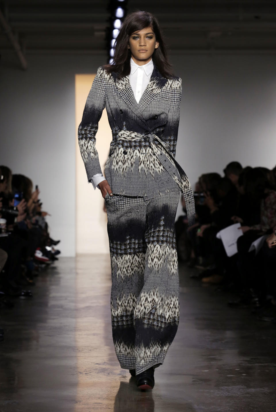 The Peter Som Fall 2014 collection is modeled during Fashion Week in New York, Friday, Feb. 7, 2014. (AP Photo/Richard Drew)